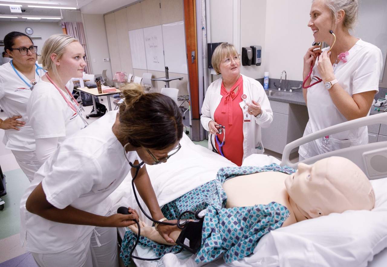 Nursing students are being instructed by Sharon Holden 